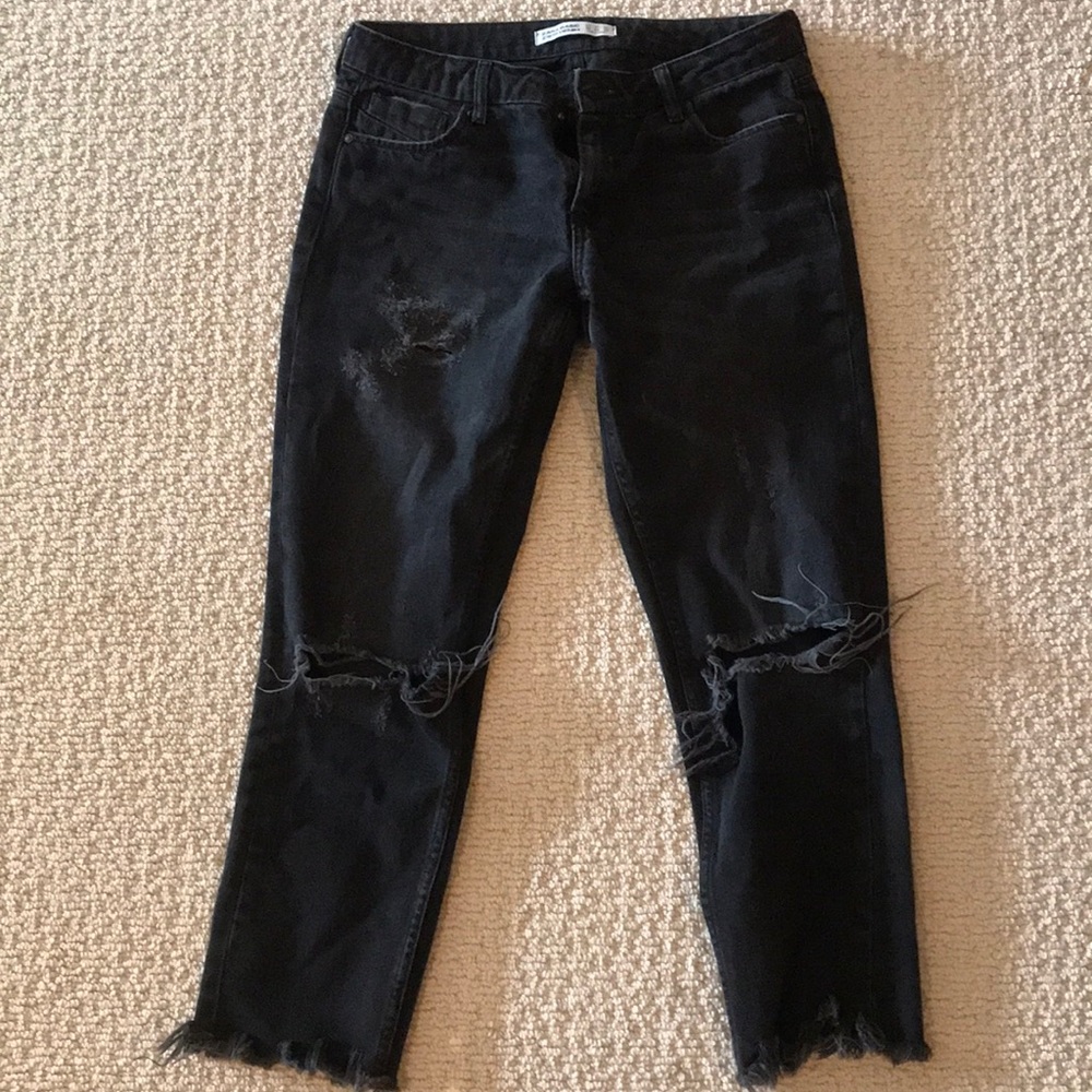 Destressed black jeans